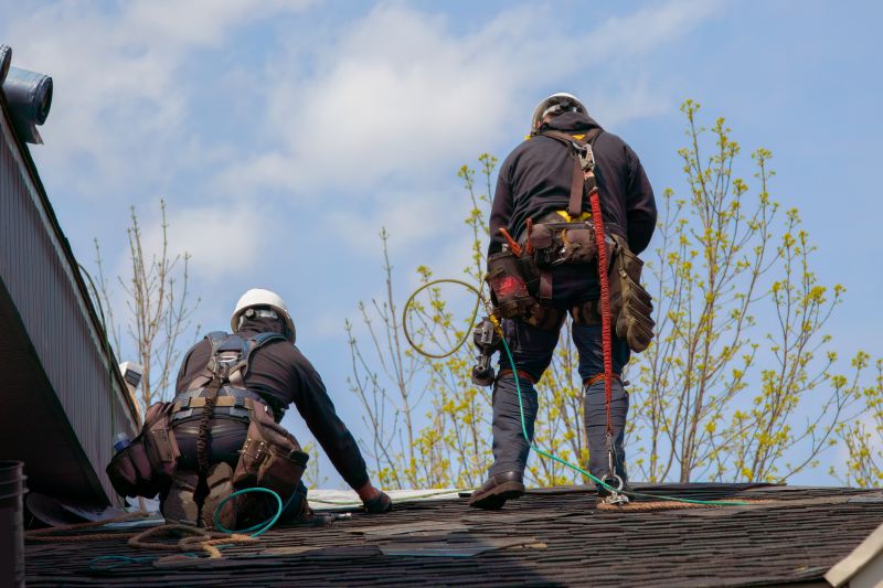Roofing Crew Working in Spring